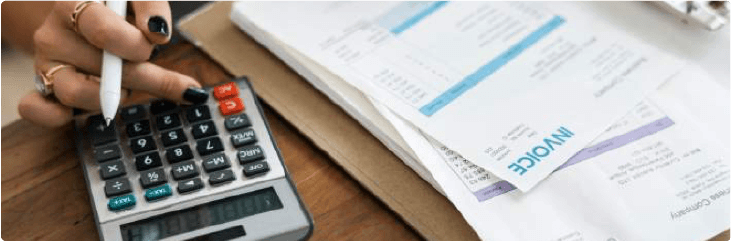 calculator next to paperwork
