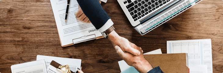 man and woman shaking hands