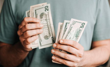 Man holding money.