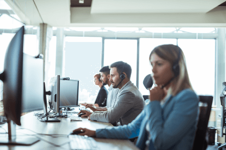 People at desks in an office