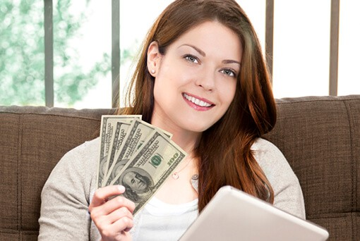 woman with cash in hand
