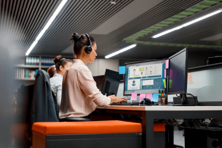 Woman at her computer in a work office