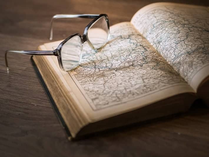 glasses on a map