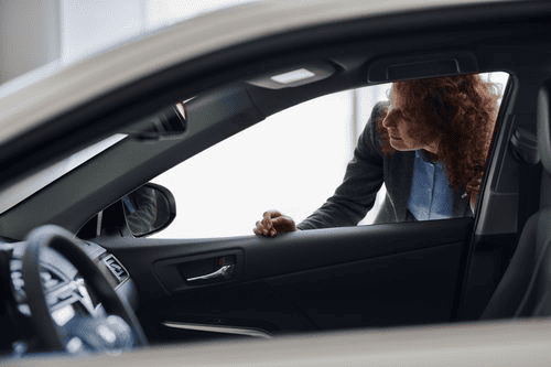 Luxury vehicle owner accessing financing through available vehicle equity