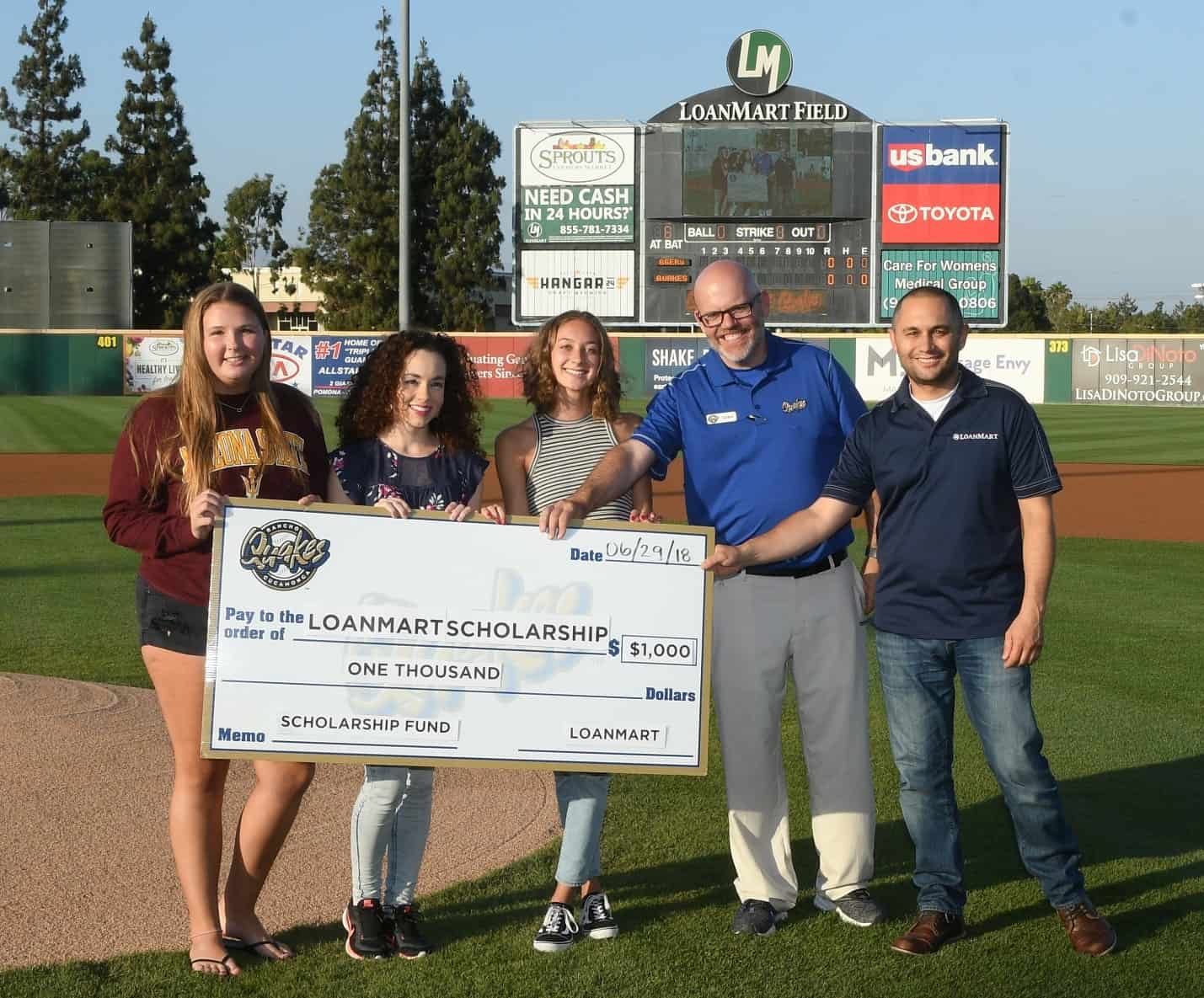 loanmart scholarship giant check
