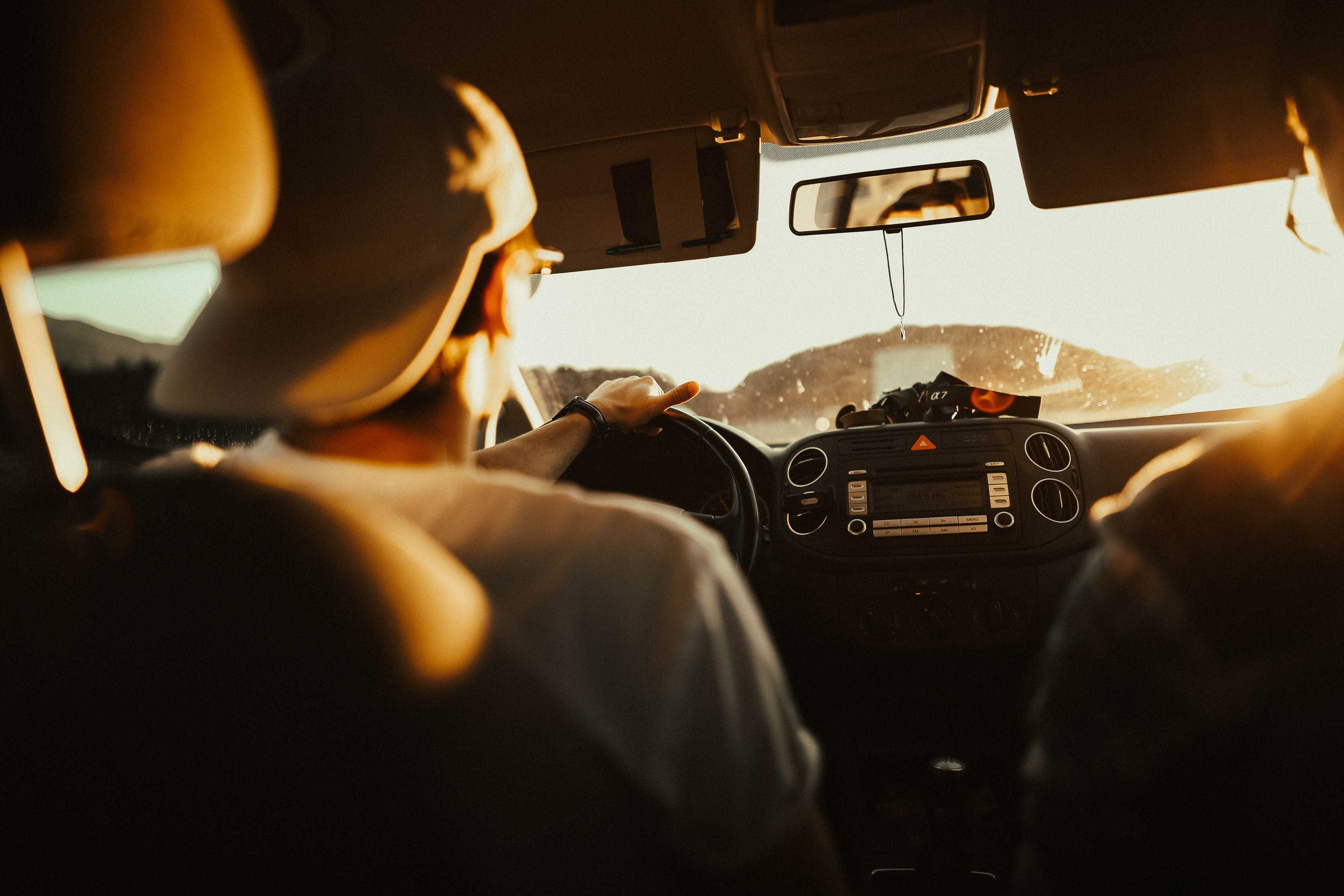 man in car for title loans