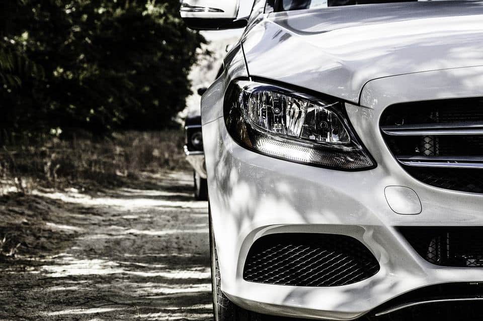front of white car