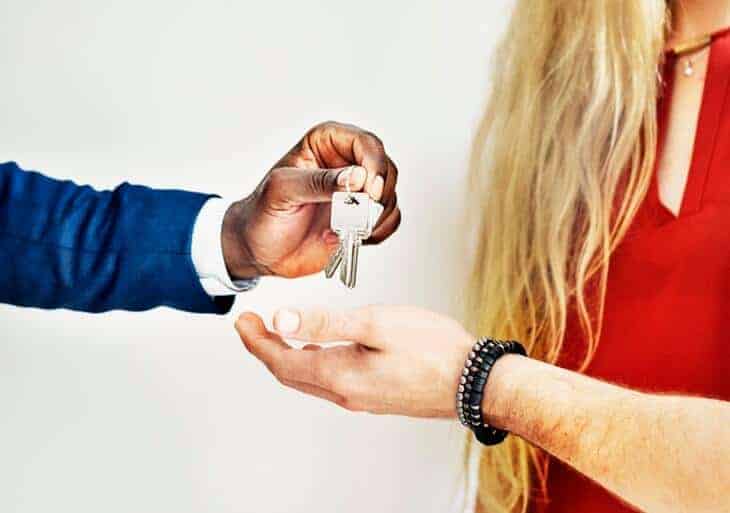 giving keys to a man