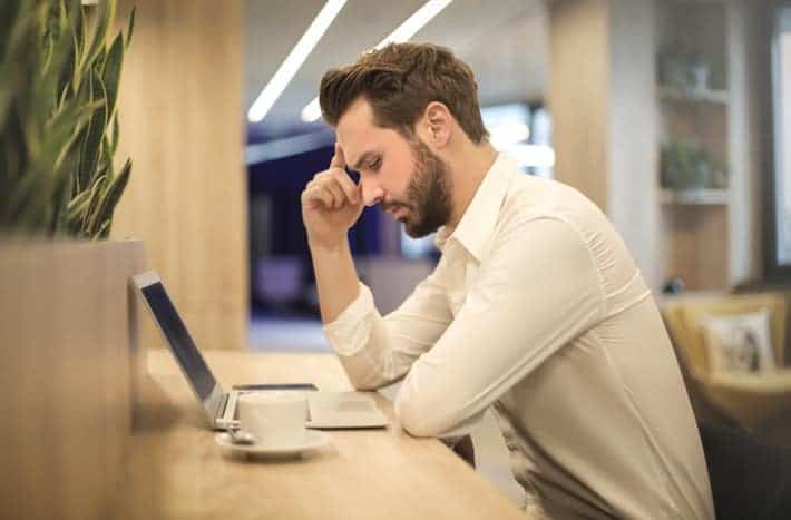 frustrated man on laptop