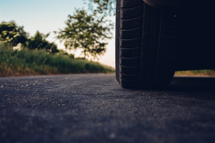 Car tire on a road