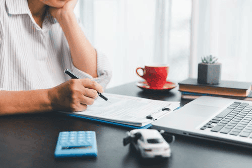 Borrower evaluating different title loan companies and financing choices