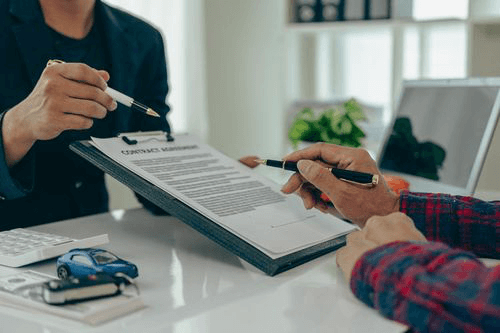 Borrower reviewing contract to extend their loan