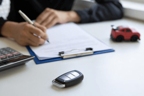 Customer signing agreement of a title loan contract