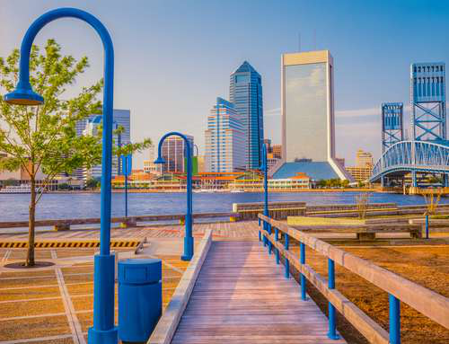 Boardwalk view of Jacksonville, Florida with the city skyline and waterfront in the background – highlighting local title loan options.