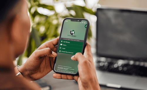 Vehicle owner completing an online car title loan application